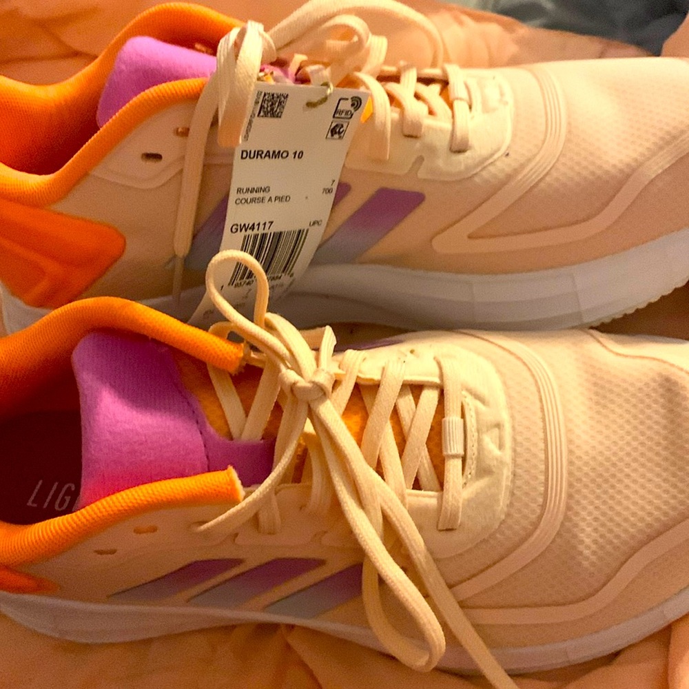 Nice adidas running or walking shoes comes without box